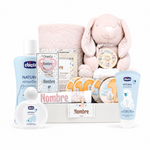 Cesta regalo bebé niña con peluche conejo rosa, chupete y productos Chicco personalizables
