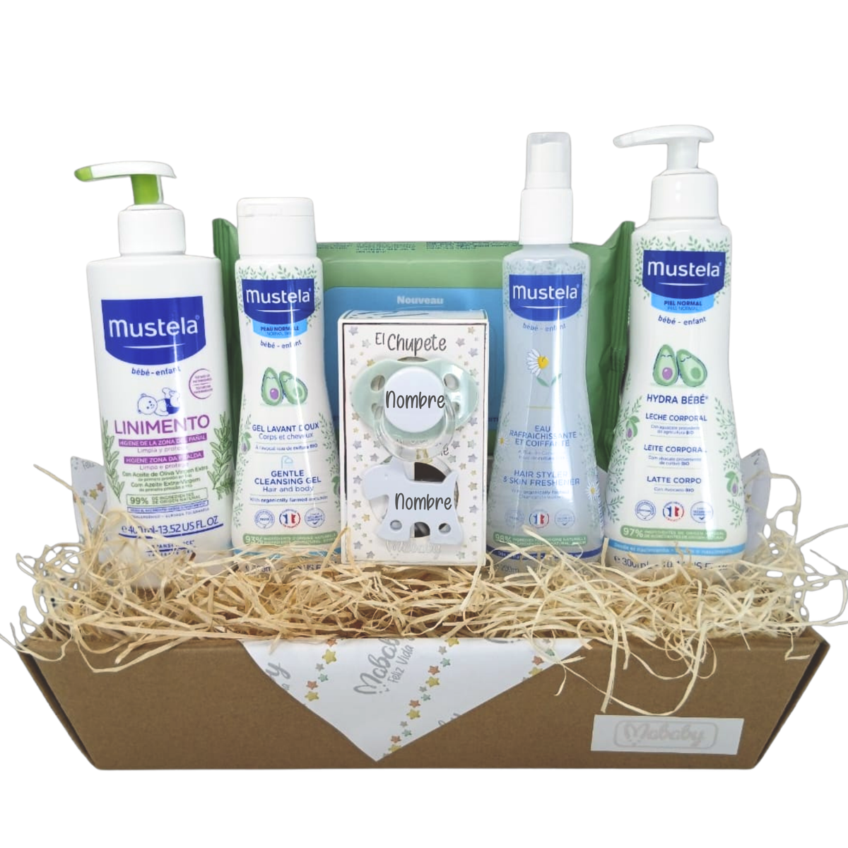 Cesta regalo bebé con productos Mustela y chupete personalizable, ideal para nacimiento niño o niña