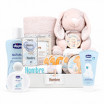 Cesta regalo bebé niña con peluche conejo rosa, productos Chicco y chupete personalizable. Ideal para nacimiento.