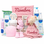Cesta de bienvenida para bebé niña con productos Mustela, manta y peluche personalizable, ideal regalo nacimiento